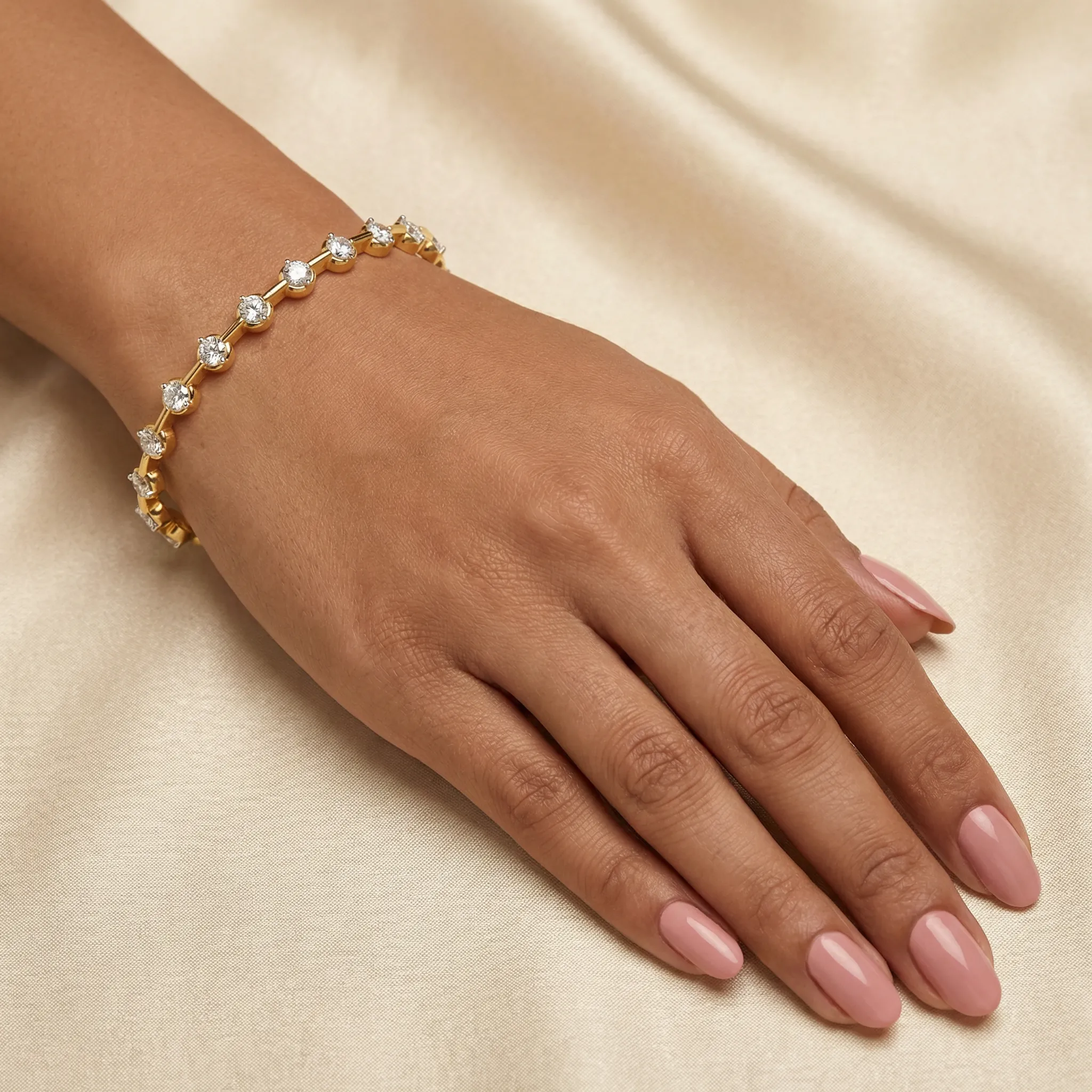 0.25 cts each Spaced Diamond Bangle